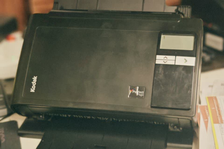 Providing document scanners with the participation of donors