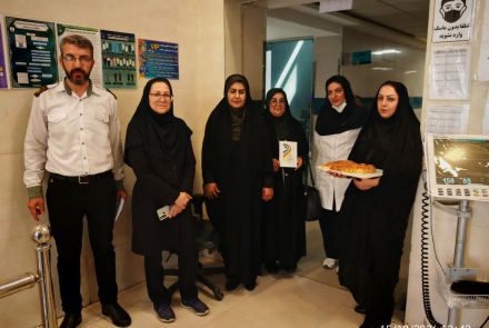 Representatives of the 'Waterfall of Affections' (Abshar-e Atefeha) Charity Honor Nurses