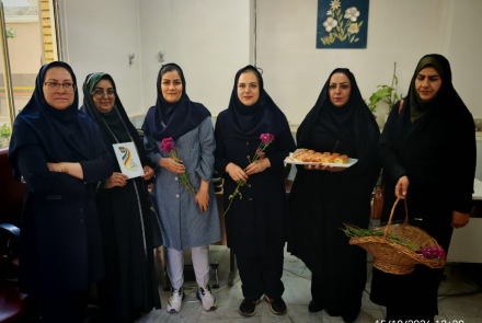 Representatives of the 'Waterfall of Affections' (Abshar-e Atefeha) Charity Honor Nurses