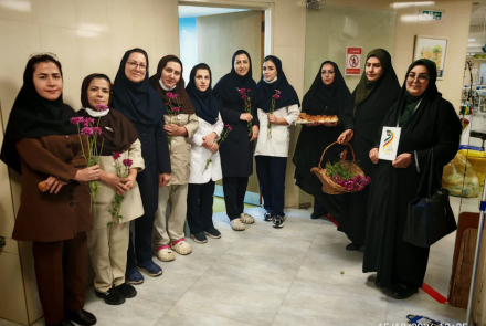 Representatives of the 'Waterfall of Affections' (Abshar-e Atefeha) Charity Honor Nurses