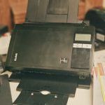Providing document scanners with the participation of donors
